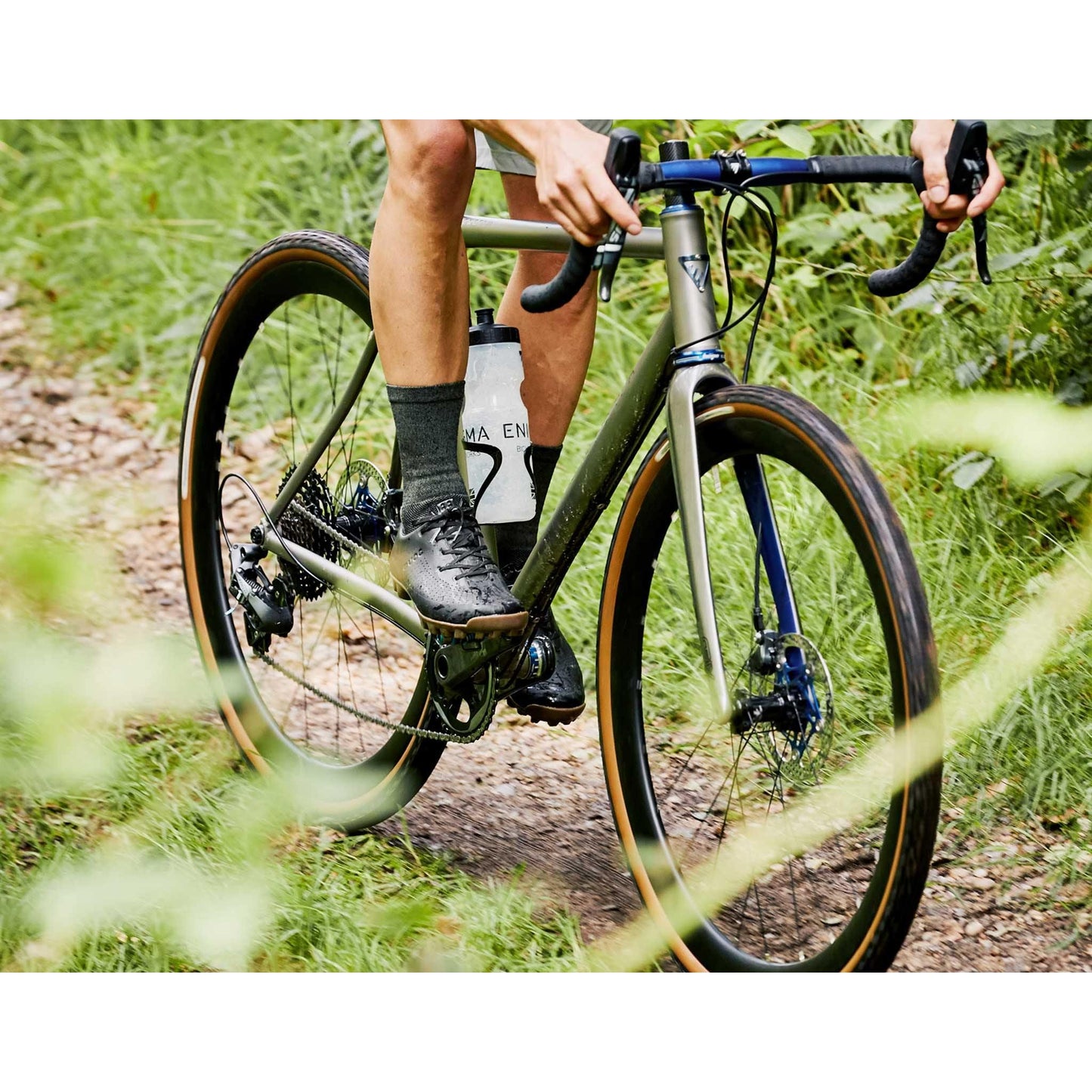 Man on a bike Wearing Green Merino Wool Cycling Socks