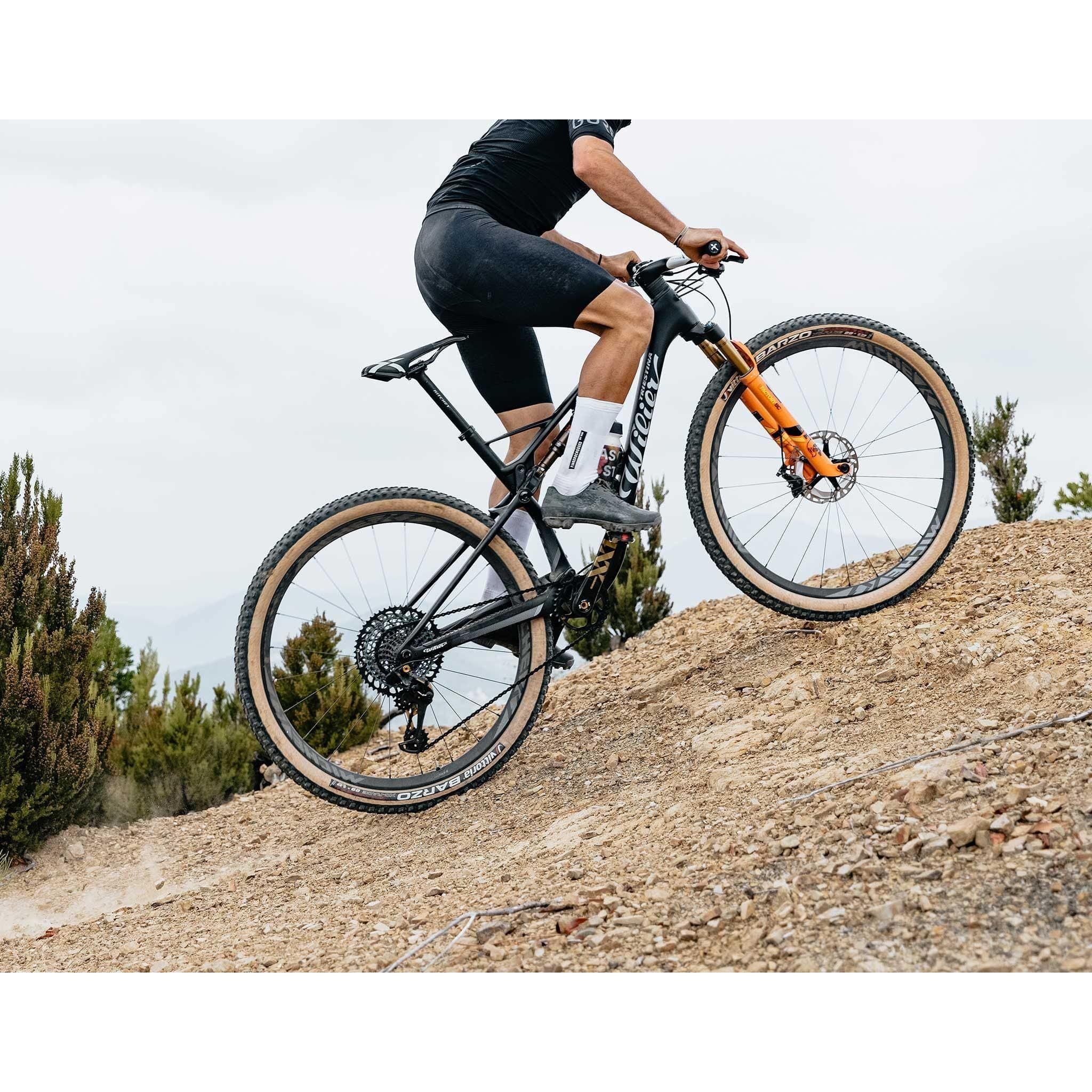 Man riding a Mountain Bike wearing Gravel shoes